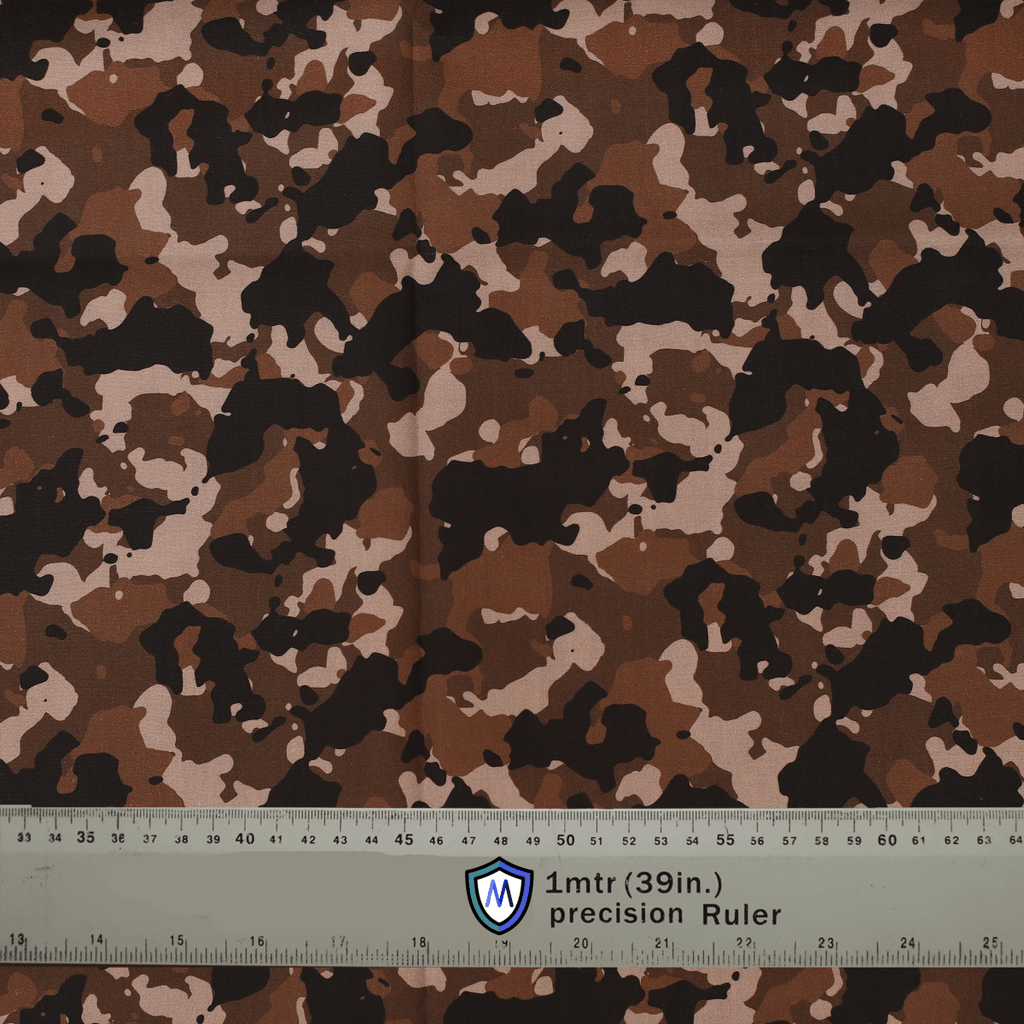 Brown camouflage fabric used for Medicus Scrub Caps, with a precision ruler for scale. Ideal for medical professionals seeking a tactical-inspired design.