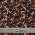Brown camouflage fabric used for Medicus Scrub Caps, with a precision ruler for scale. Ideal for medical professionals seeking a tactical-inspired design.