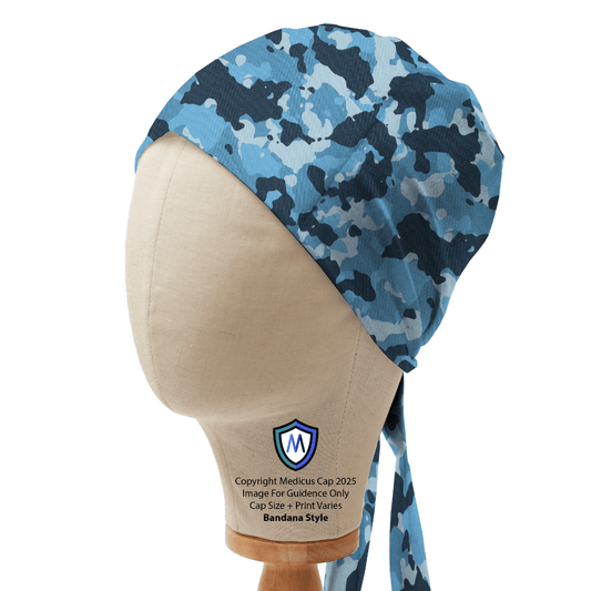 Blue camouflage Medicus Scrub Cap in bandana style displayed on a mannequin head. Lightweight, adjustable, and designed for medical professionals.