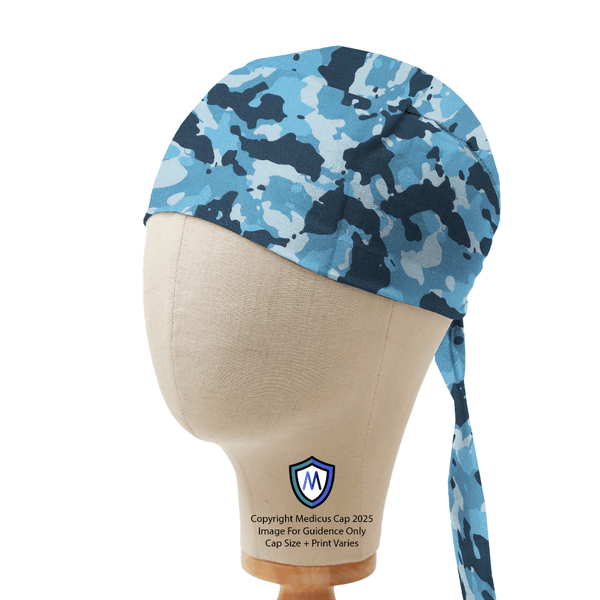 A blue camouflage Medicus Scrub Cap displayed on a mannequin head, featuring a tie-back design for a secure fit.