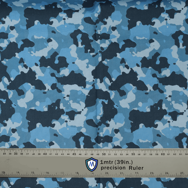 Blue camouflage fabric for Medicus Scrub Caps, measured with a precision ruler for accuracy.