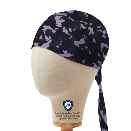 Black and purple camouflage Medicus Scrub Cap displayed on a mannequin head, featuring a tie-back design for adjustable fit.