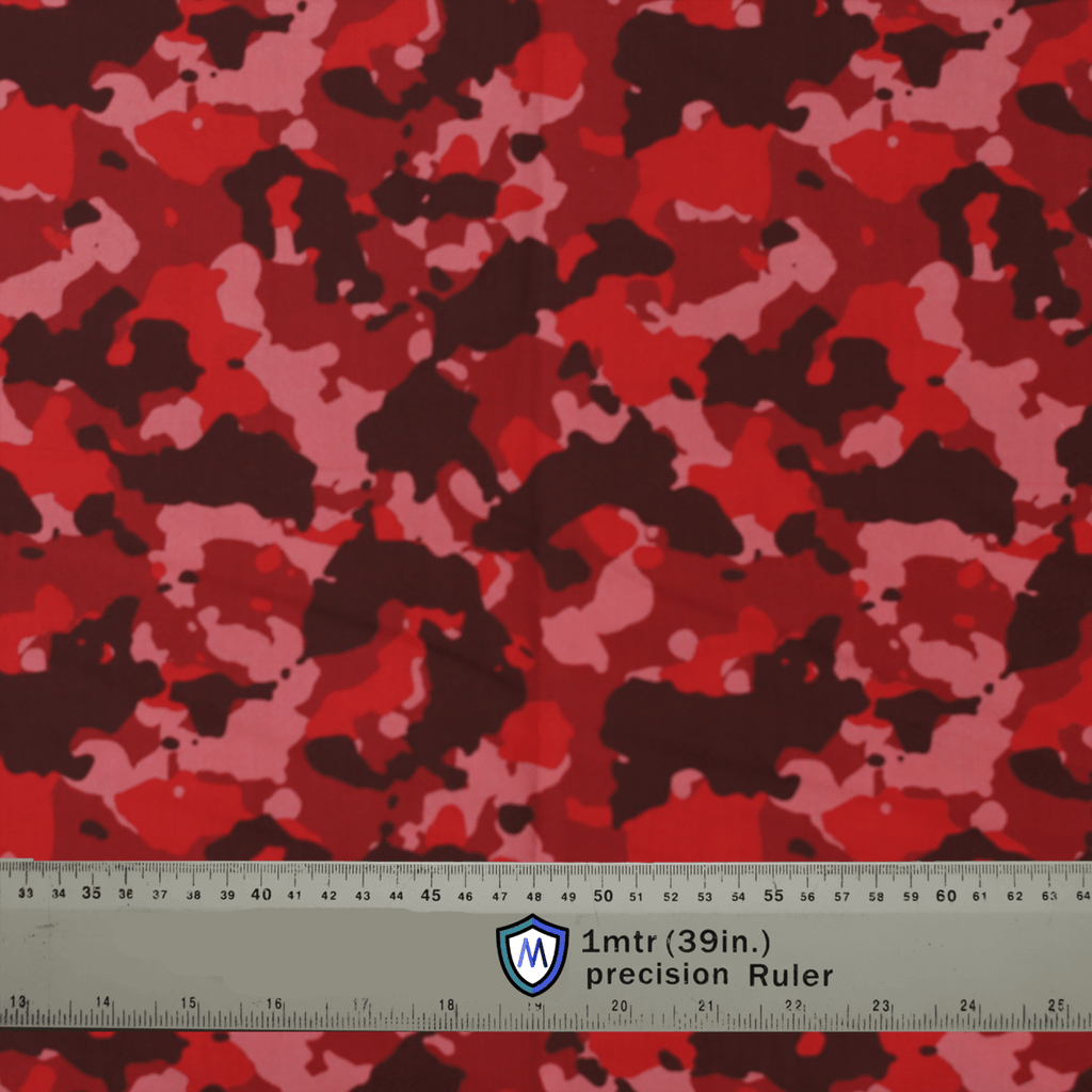 Red camo fabric for Medicus Scrub Caps with a precision ruler for scale. Bold, stylish design for medical professionals.