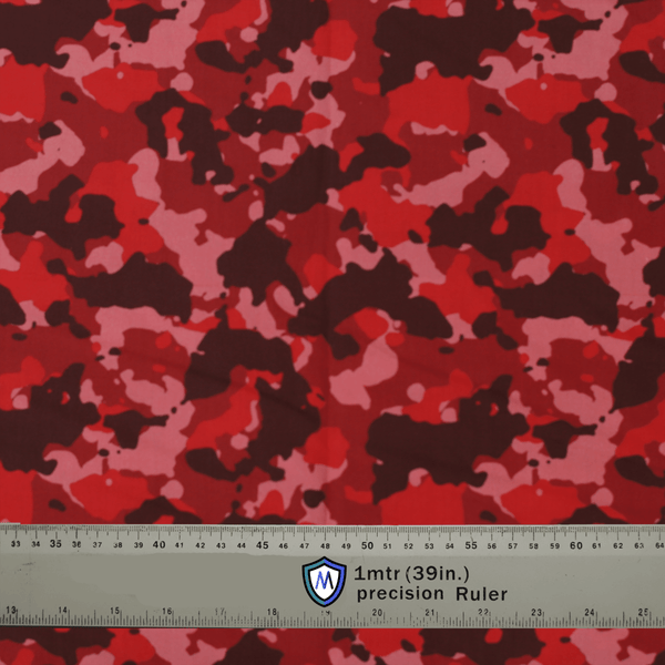Red camo fabric for Medicus Scrub Caps with a precision ruler for scale. Bold, stylish design for medical professionals.