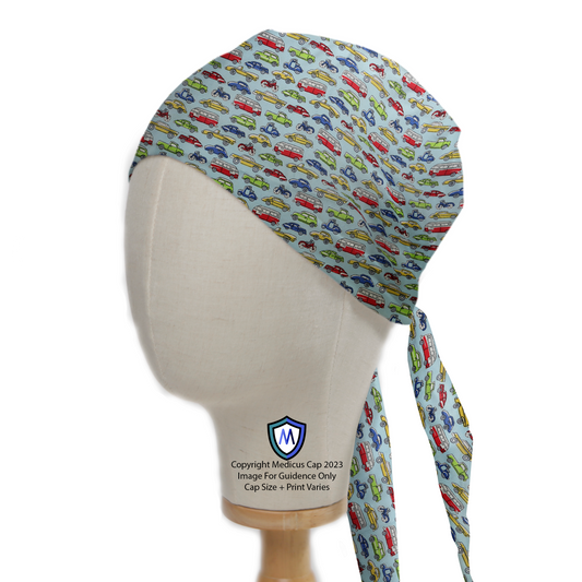 The Cartoon Cars Bikes Traffic Scrub Cap by Medicus Scrub Caps features a playful vehicle pattern on a blue fabric with tied straps at the back.