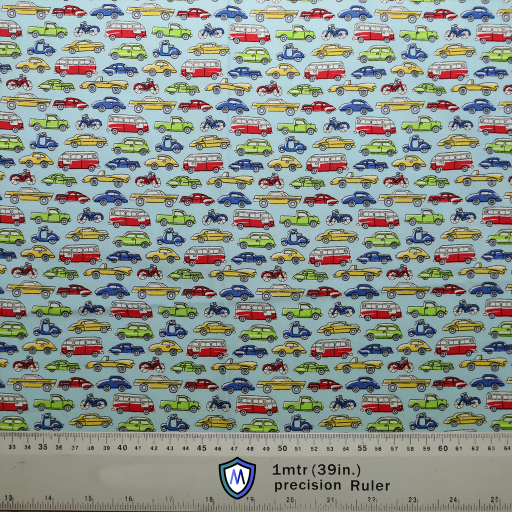 The Medicus Scrub Caps Cartoon Cars Bikes Traffic Scrub Cap features colorful cars, bikes, and buses on a light blue background. A 1-meter scale is included.