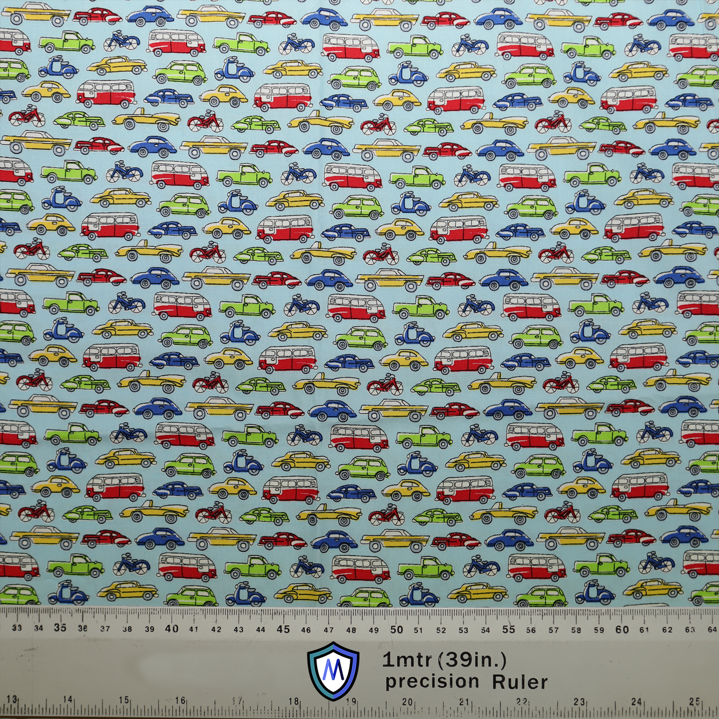 The Medicus Scrub Caps Cartoon Cars Bikes Traffic Scrub Cap features colorful cars, bikes, and buses on a light blue background. A 1-meter scale is included.