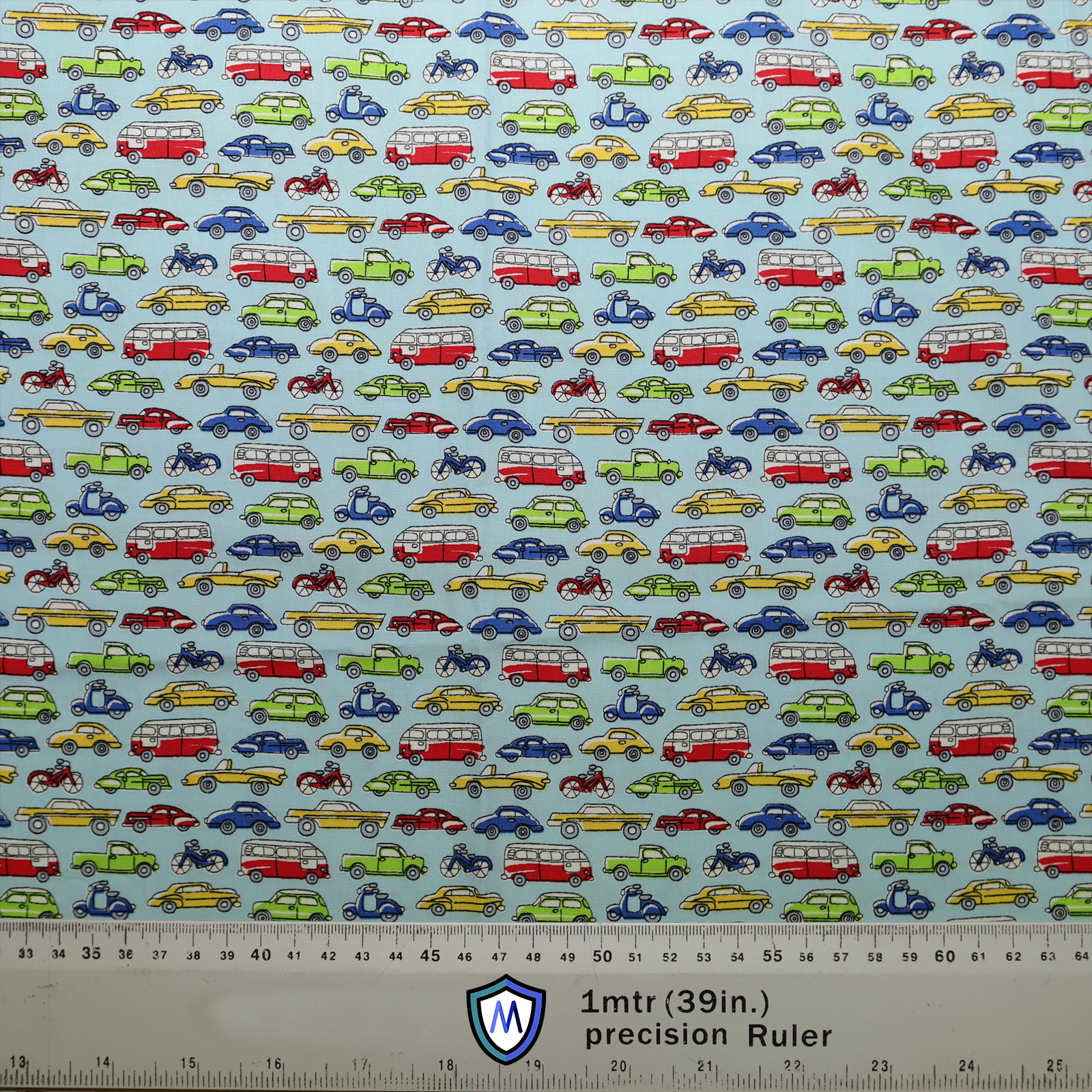 The Medicus Scrub Caps Cartoon Cars Bikes Traffic Scrub Cap features colorful cars, bikes, and buses on a light blue background. A 1-meter scale is included.