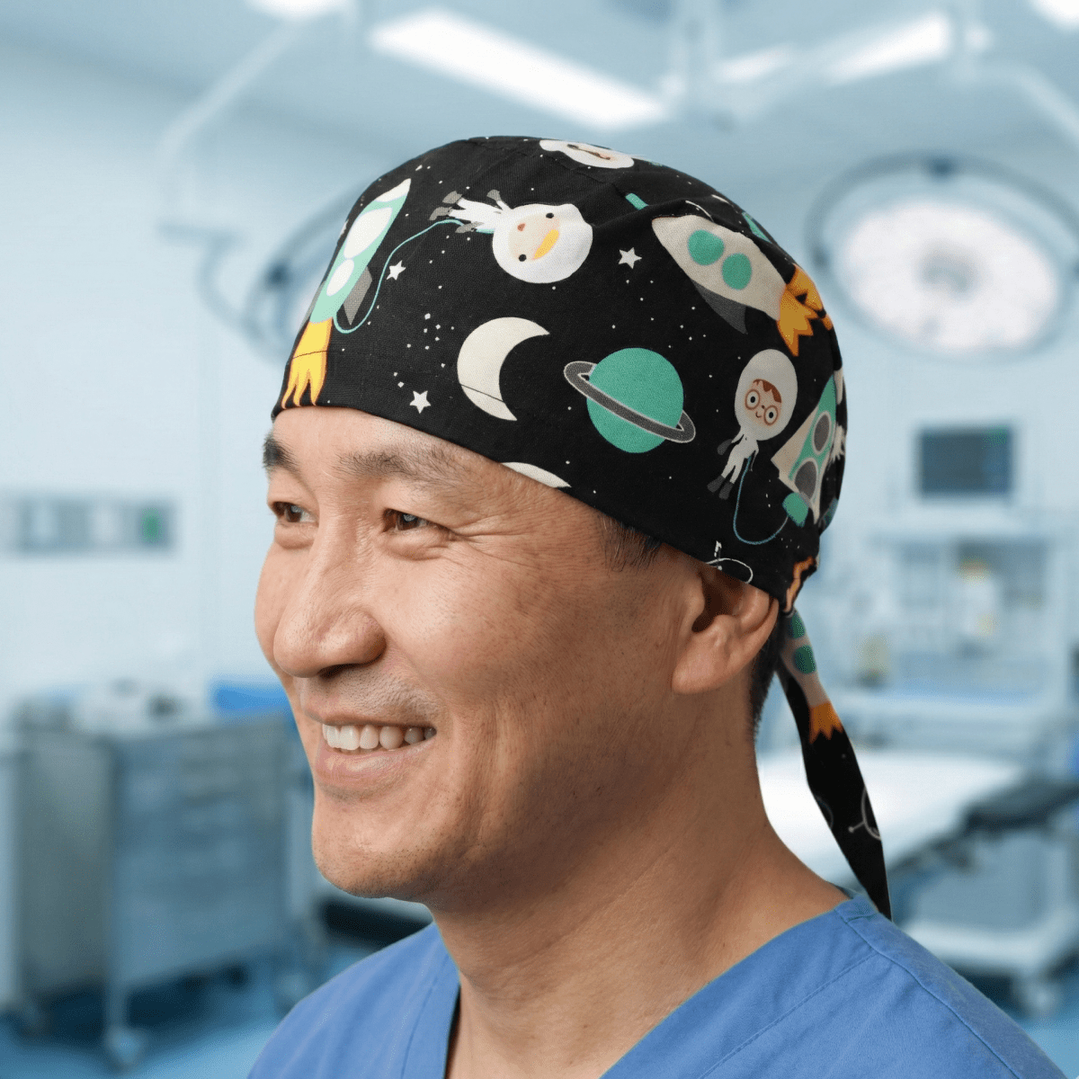 Cartoon Spaceships Blue Scrub Cap scrub cap flat lay view