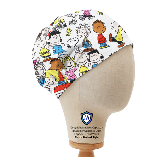 Mannequin head wearing a Medicus Scrub Cap with Charlie Brown, Snoopy, and Peanuts characters on a white background. Elastic-backed style.