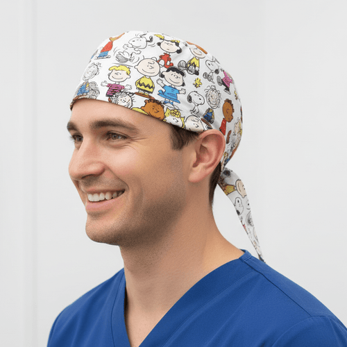Charlie Brown Snoopy + Friends In Crowd scrub cap shown on model