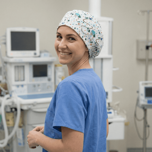 Christmas Winter House scrub cap shown on model