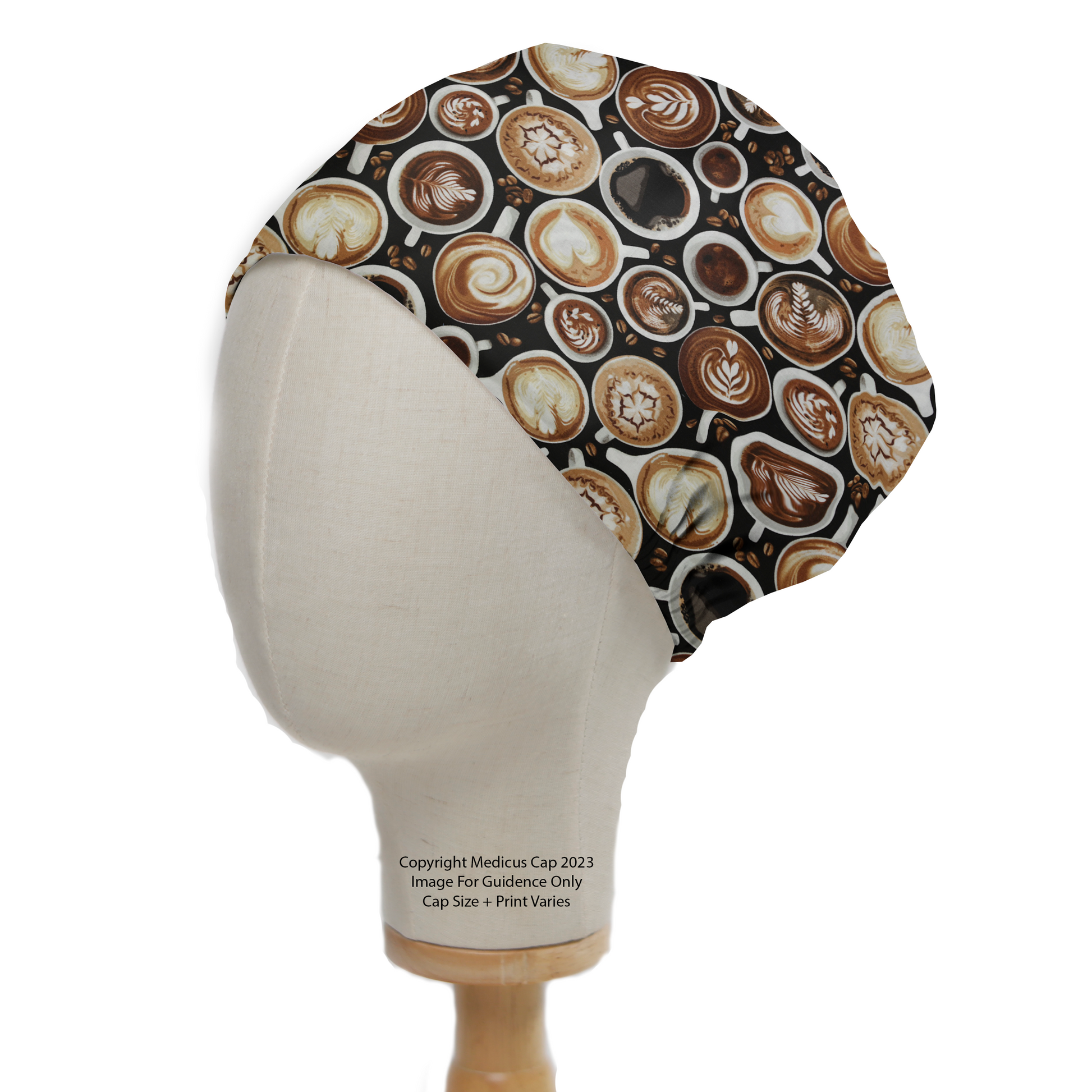 The Coffee Runs My Brain Scrub Cap by Medicus Scrub Caps features a coffee-themed pattern with latte art, displayed on a mannequin head.