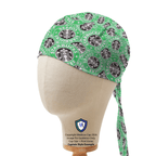Green Starbucks logo patterned scrub cap shown on mannequin head displaying side profile view