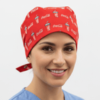 Red Coca Cola logo pattern scrub cap with tie-back closure on smiling healthcare worker