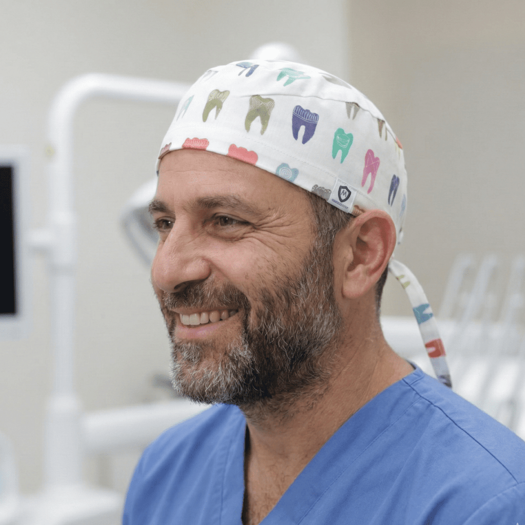 Colourful Tooth Dentist scrub cap shown on model