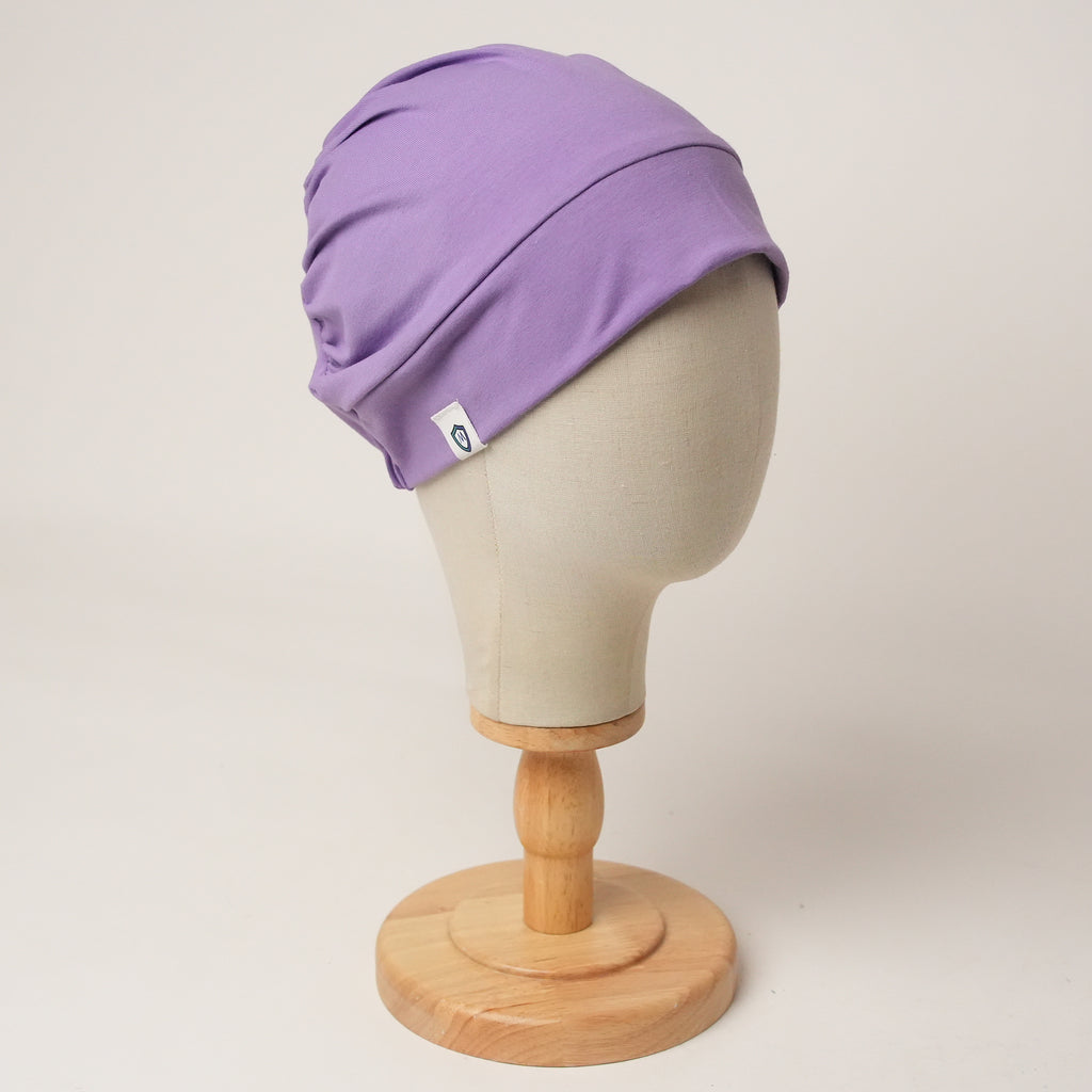 Contour stretch scrub cap in lilac, front view