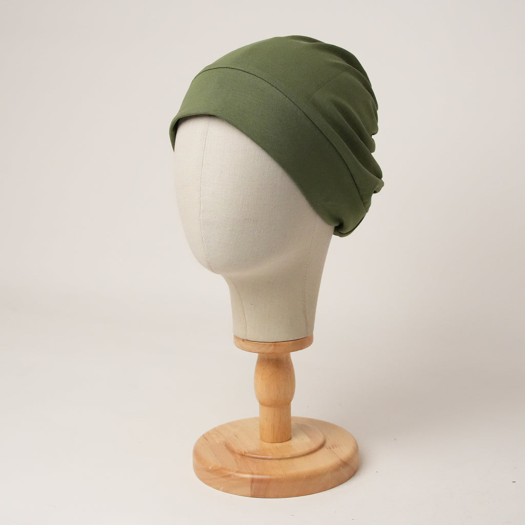 Contour stretch scrub cap in olive, front view