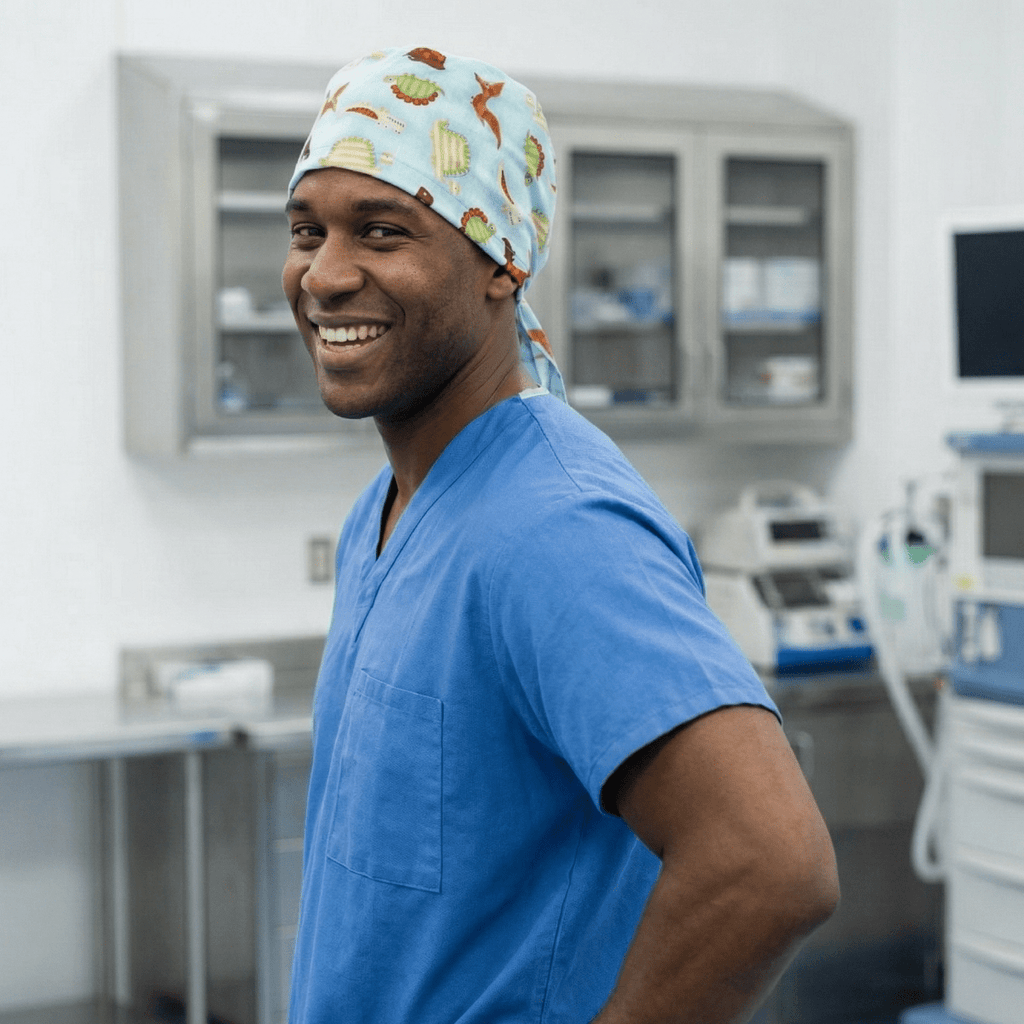 Dinosaurs in a Swamp Light Blue scrub cap pattern detail on mannequin