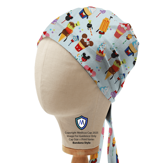 Medicus Scrub Cap with a Disney summer treats pattern featuring ice creams, lollies, and Mickey-themed sweets on a light blue background. Bandana style.