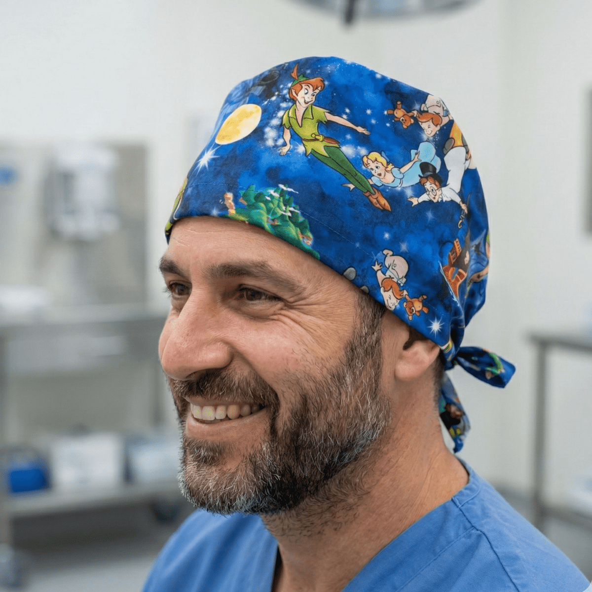 Disney Peter Pan scrub cap shown on model