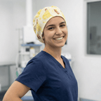 Disney Princesses scrub cap shown on model
