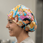 Disney Princesses Crowd scrub cap shown on model