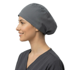 Charcoal grey elastic back scrub cap worn by smiling healthcare professional