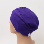 Purple solid color Duchess scrub cap showing elastic back detail on mannequin head