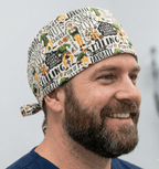 Elf The Movie scrub cap shown on model