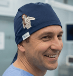 Embroidery - Breast Cancer Awareness - scrub cap shown on model