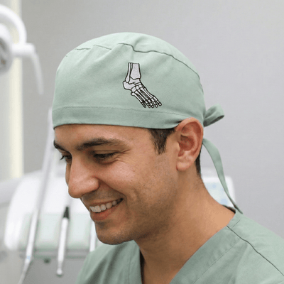 Embroidery - Skeleton Foot - scrub cap shown on model