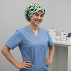 Eyes Teal scrub cap shown on model
