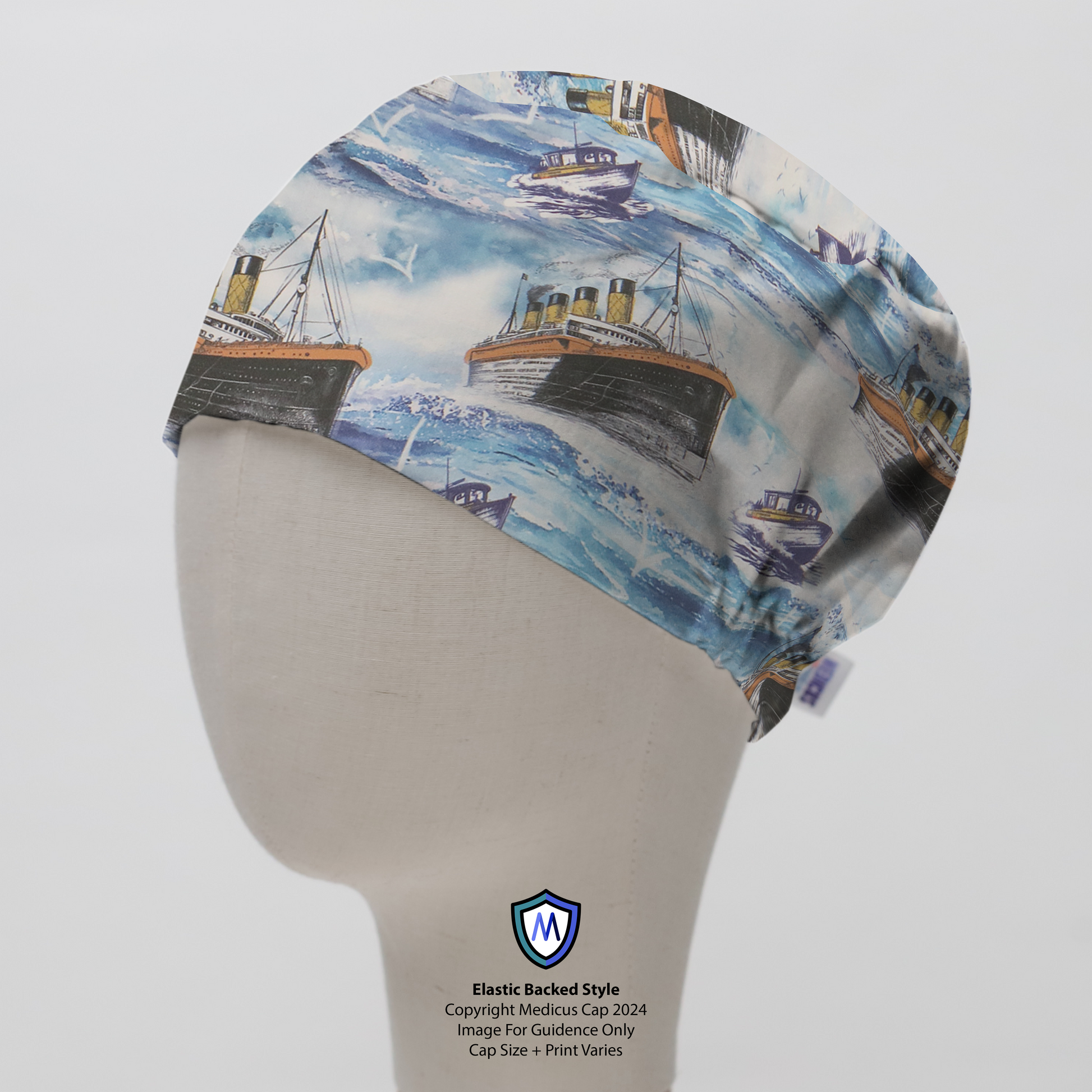 Ferry Boat Scrub Cap - Grey’s Anatomy inspired design from Medicus Scrub Caps. Elastic-backed style featuring a nautical-themed print with vintage ships on blue waves.