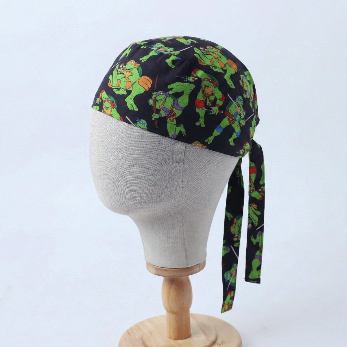 Fighting TMNT Teenage Mutant Ninja Turtles on black Scrub Cap