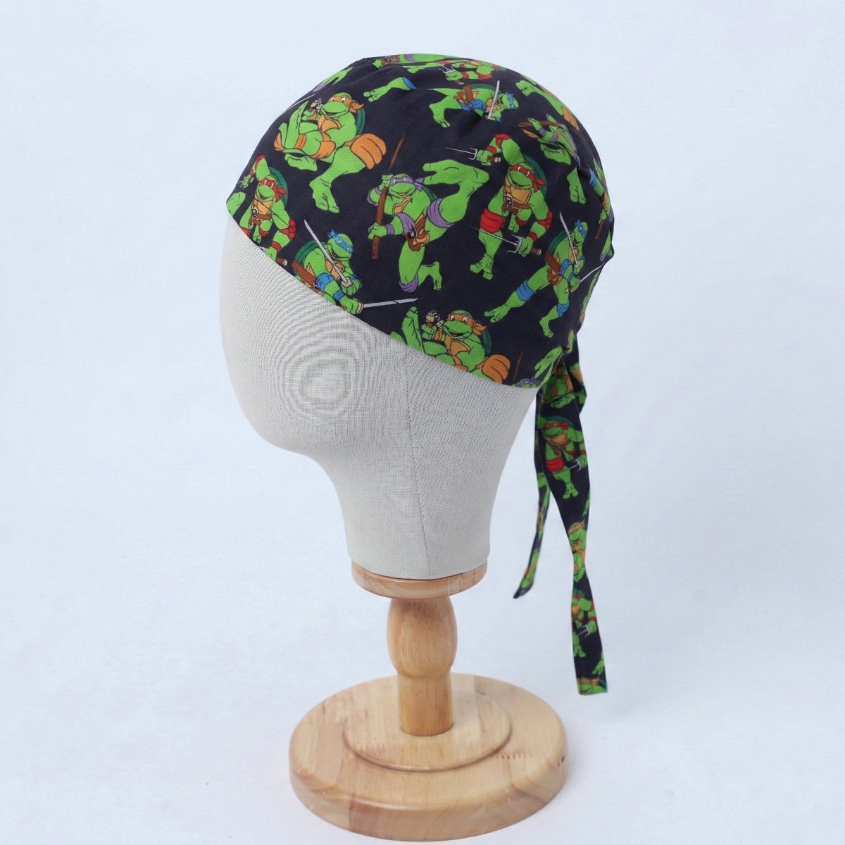 Fighting TMNT Teenage Mutant Ninja Turtles on black Scrub Cap