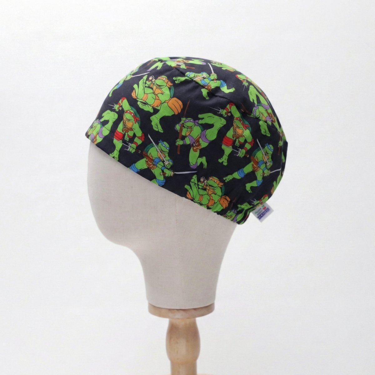 Fighting TMNT Teenage Mutant Ninja Turtles on black Scrub Cap