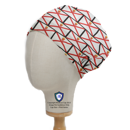 A mannequin head displays the eco-friendly Medicus Scrub Caps Flag Jersey Island Scrub Cap, featuring intersecting red and black lines with shield emblems, set on a wooden stand.