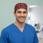 Floral Poppies scrub cap shown on model