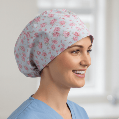 Floral Roses Small On Blue scrub cap shown on model