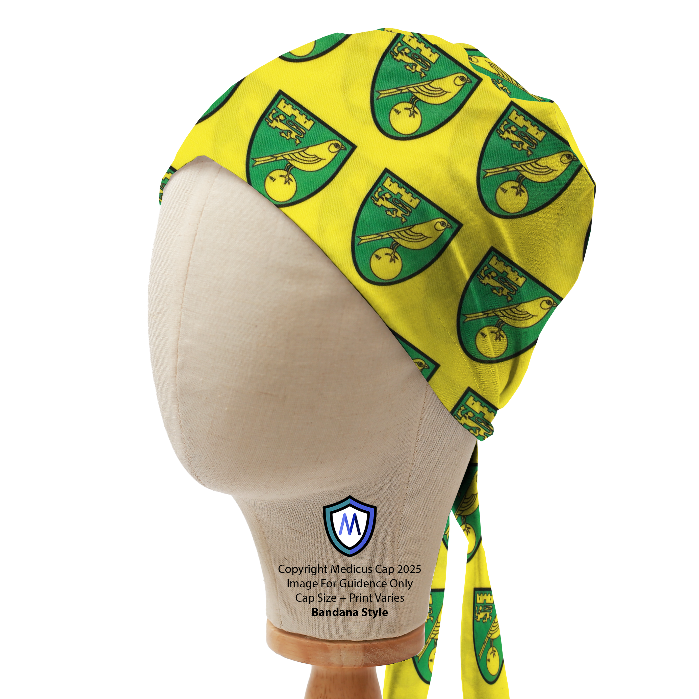 Mannequin head wearing a yellow Medicus Scrub Cap with multiple Norwich City FC crests in green and gold, bandana style.