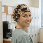 Side view of woman in scrub cap with German Shepherd pattern