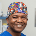 Halloween Scary Clowns scrub cap shown on model