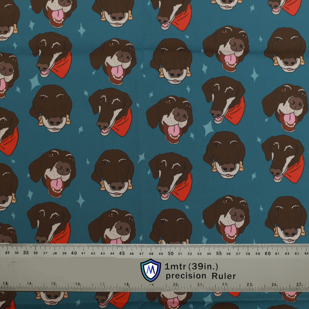 The Medicus Scrub Caps Happy Dog Neckerchief features cartoon brown dogs with red bandanas on a teal background with stars. A ruler provides scale.