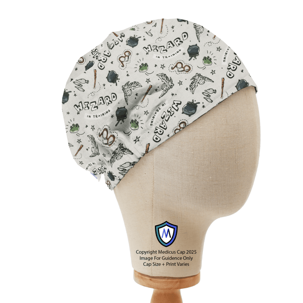 Harry Potter Wizard In Training Scrub Cap by Medicus Caps, featuring a magical-themed print with an elastic back for a secure and comfortable fit.