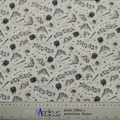 Close-up of Harry Potter Wizard In Training fabric for Medicus Scrub Caps, featuring wands, owls, cauldrons, and text, perfect for wizarding fans.