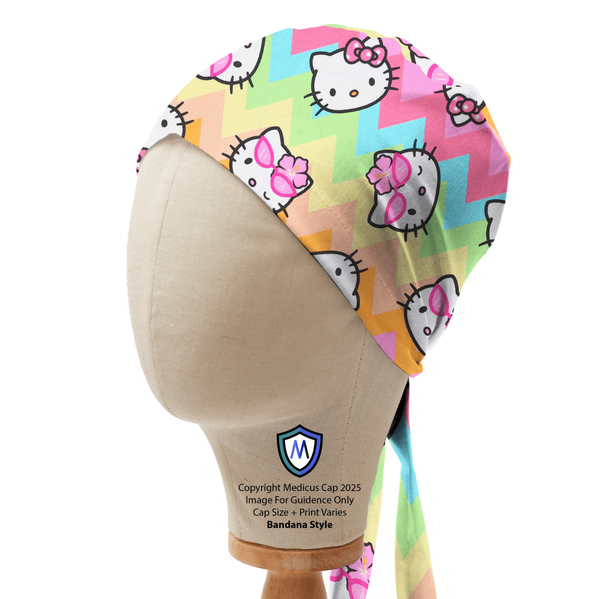 Bandana style scrub cap featuring Hello Kitty on pastel rainbow zigzag pattern with chevron stripes, shown on mannequin side view.