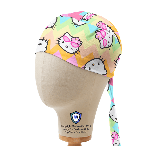 Captain style scrub cap featuring Hello Kitty on pastel rainbow zigzag pattern with chevron stripes, shown on mannequin side view.