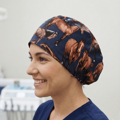 Horses Running On Navy scrub cap shown on model