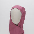 A faceless mannequin wears the Medicus Scrub Caps Orthopaedic Surgical Hood Scrub Cap in pink, showcasing its protective design and durable fabric against a white background.